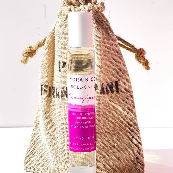 Lucy B's + HYDRA BLOOM - Wholesale Parfumroller - Roze strandgolven van Frangipani rollen op olie