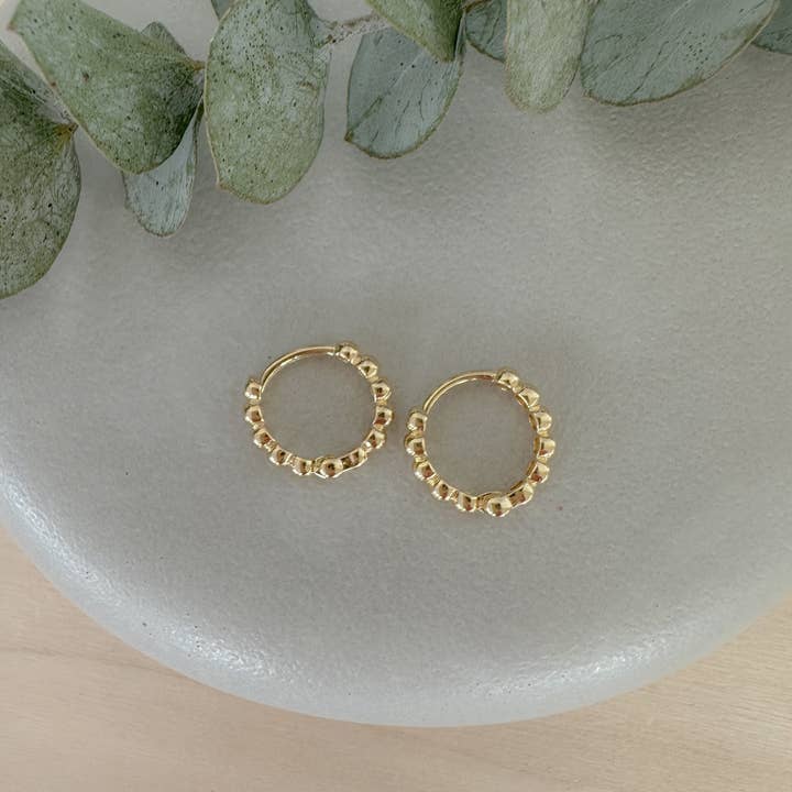 Gold Ball Huggie for wholesale by Amethyst and Opal