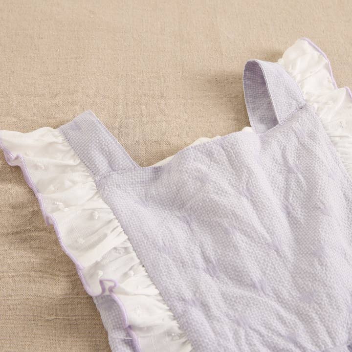 Lila Jumpsuit för flicka med hjärtan och volanger för wholesale på Faire2