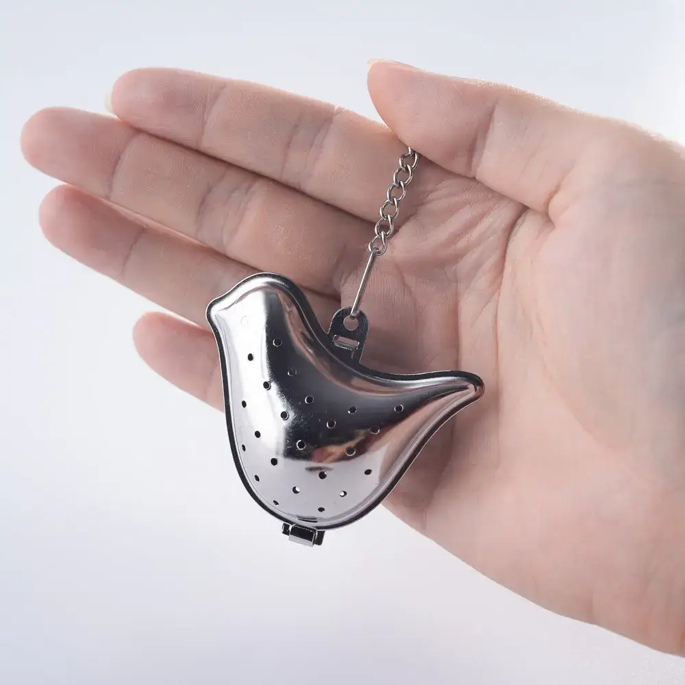 Magnifique Hearts - Wholesale Theevergiet/infuser - Vogelvormige thee-ei van roestvrij staal met lekbakje1