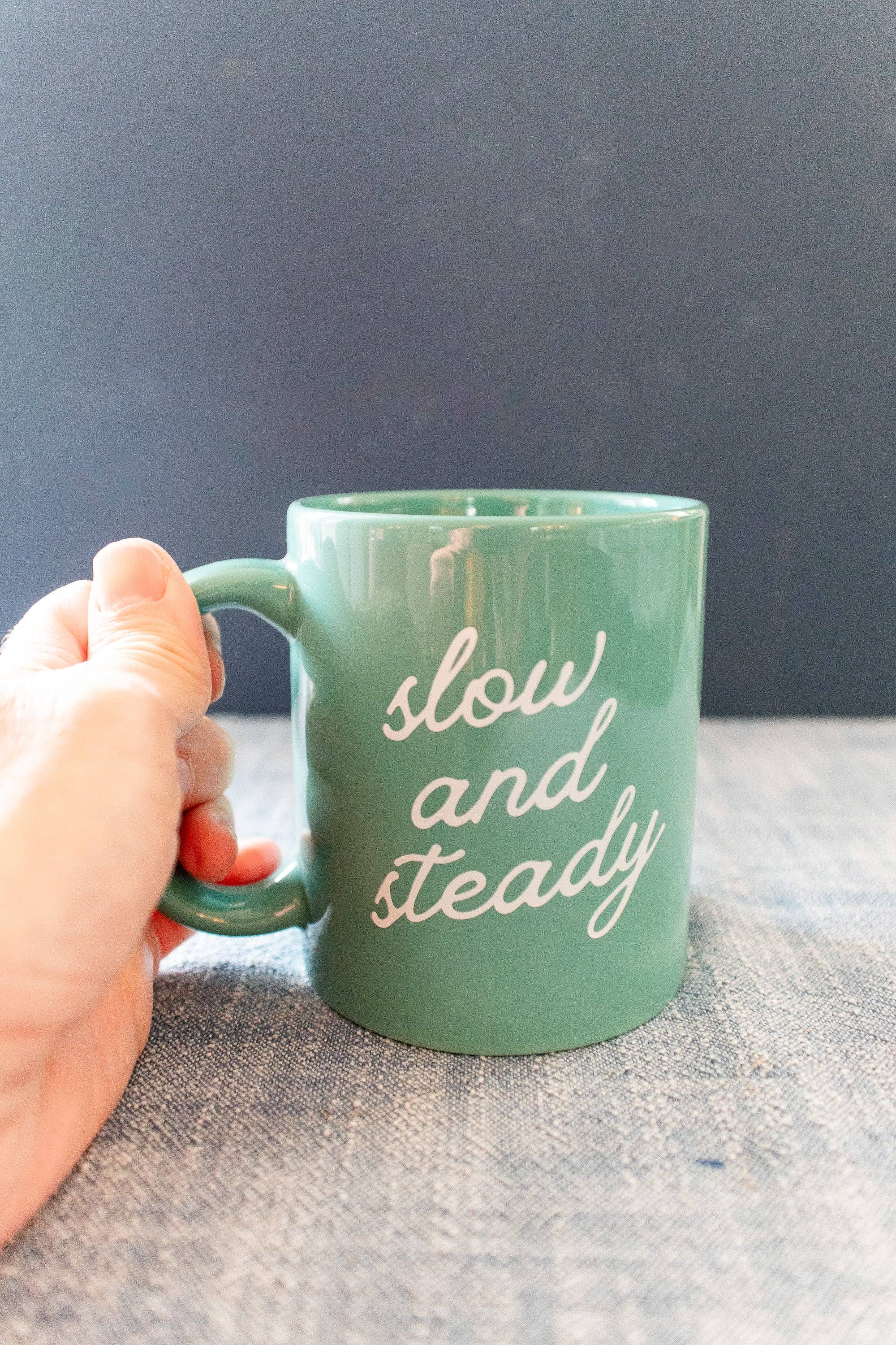 Gather Goods Co - Cards, Coasters, Tea Towels, Art, Mugs - Wholesale Coffee Mug - Green Ceramic Coffee Mug with Slow and Steady Phrase, 11oz2