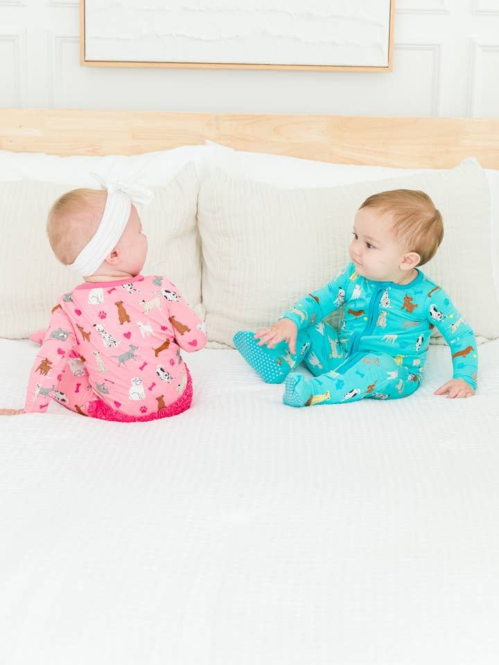 SoftSnooze™ Baby Girls Bamboo Viscose Pink Puppy Playtime Footed Ruffle One Piece Pajama
for wholesale on Faire3