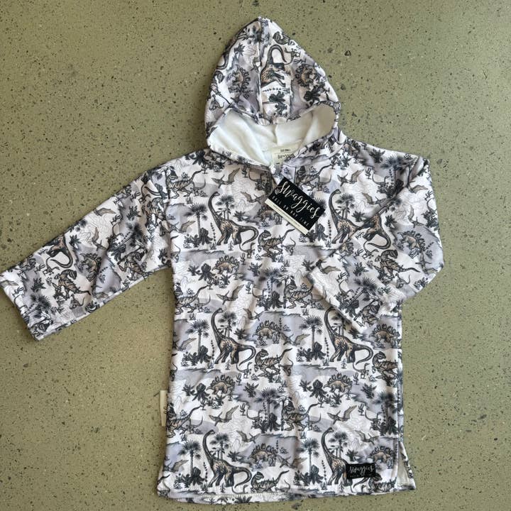 SERVIETTE À CAPUCHE LE PETIT DINOSAURE pour la vente par Daycare Swaggies