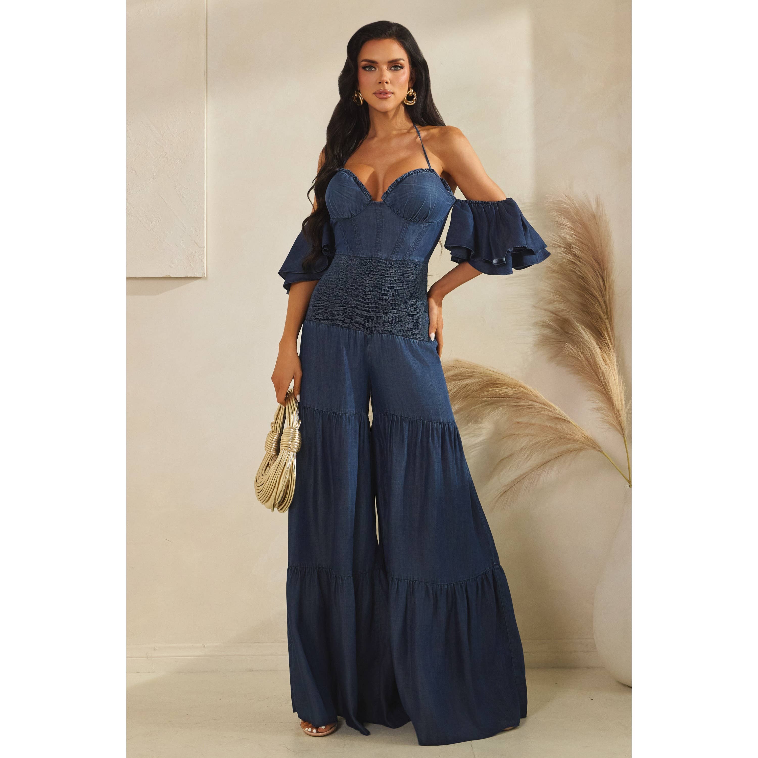 DARK DENIM MINI RUFFLE HALTER NECK TIERED JUMPSUITS for wholesale on Faire0