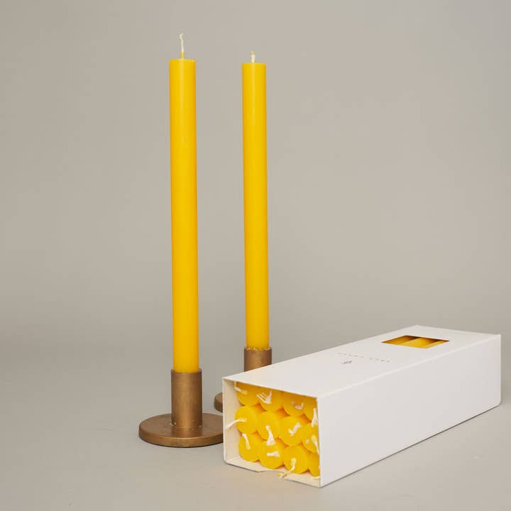 Yellow Coloured Box of 12 Taper Candles - 12hr Burn for wholesale by True Grace