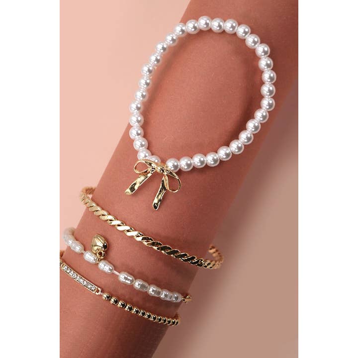 GOLD BOW PEARL RHINESTONE BAR STRETCH BANGLE SET | 80B137 for wholesale on Faire