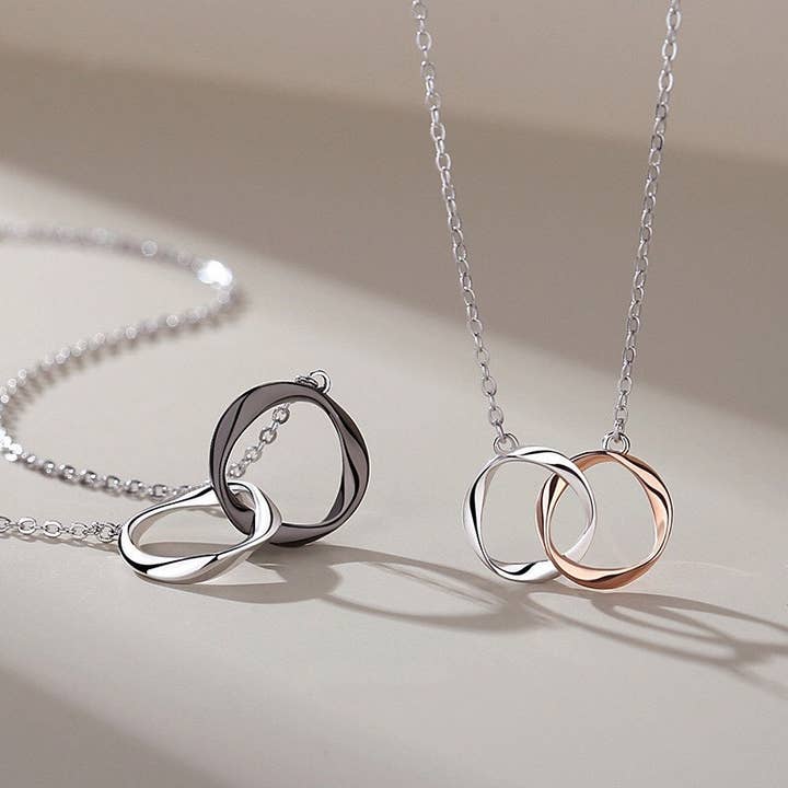 Interlocking Mobius Couple Necklace in 925 Sterling Silver and other Purchase Wholesale mobler. Free Returns & Net 60 Terms on Faire trending on Faire.