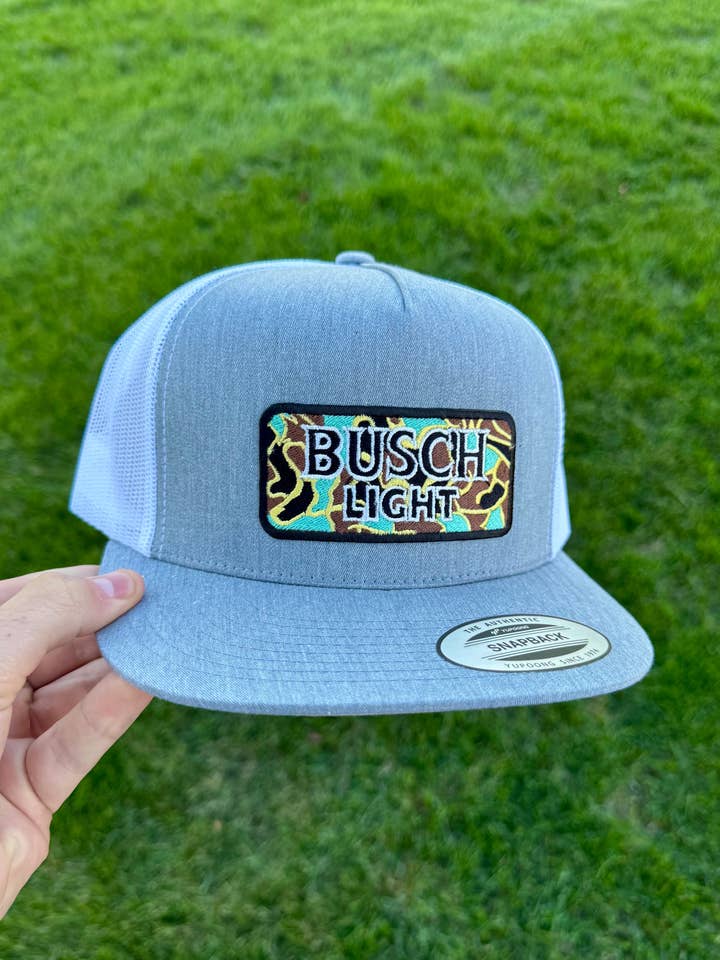 Busch Light Camo Patch Grey/White Snapback for wholesale by River Bent Hat Co.