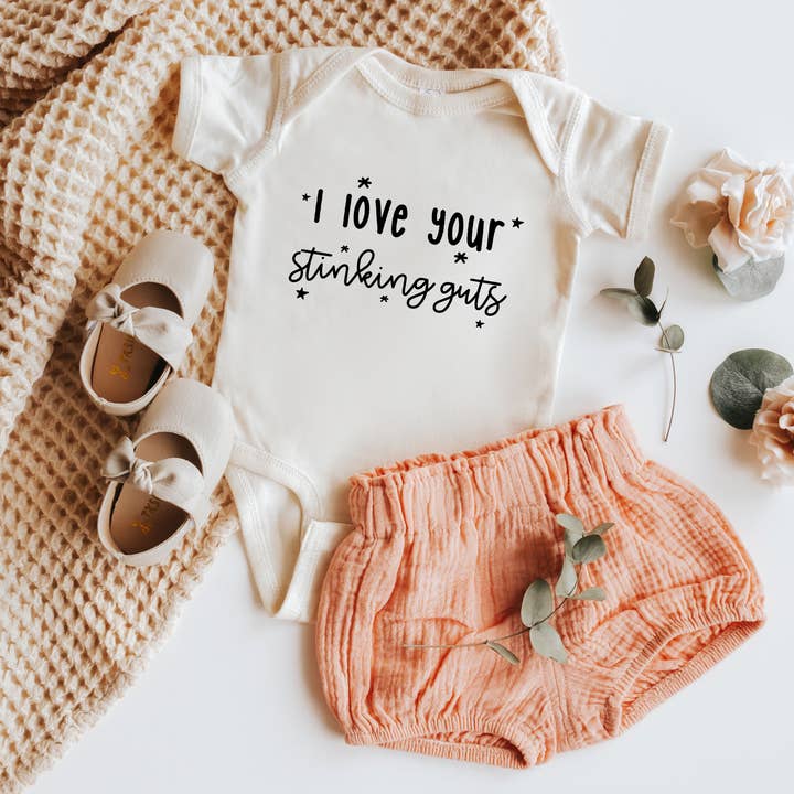 I Love Your Stinking Guts | 100% Cotton Baby Bodysuit or Tee and other Purchase Wholesale i heart guts. Free Returns & Net 60 Terms on Faire trending on Faire.