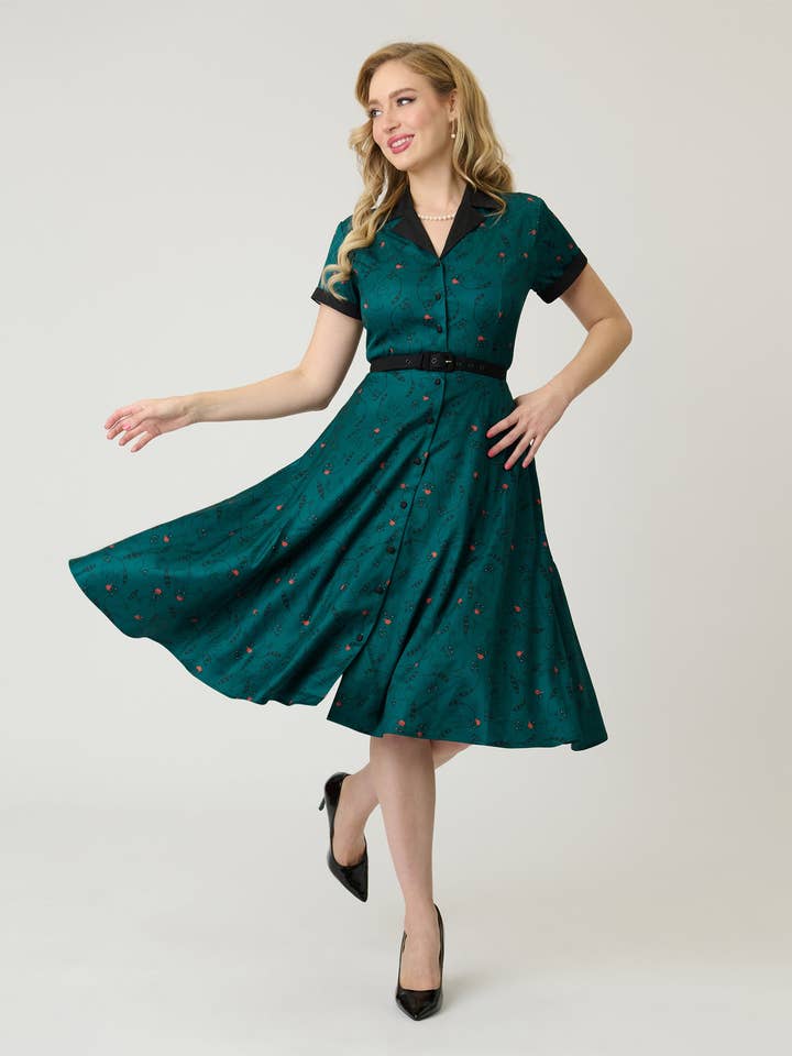 Unik Vintage Teal Raccoon Print Alexis Swingklänning för wholesale av Unique Vintage