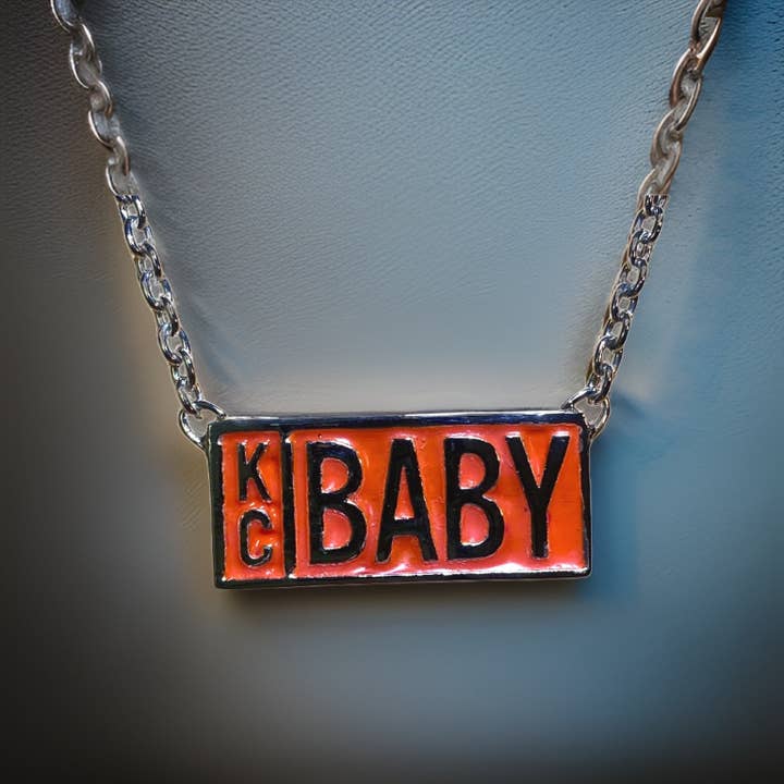 KC Baby Logo Pendant Necklace for wholesale by The Urban Charm