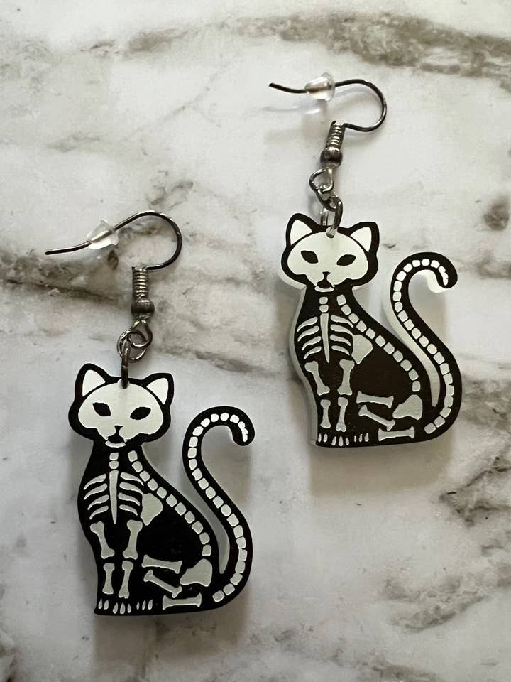 Animaux de compagnie squelettes qui brillent dans le noir pour la vente par SDM