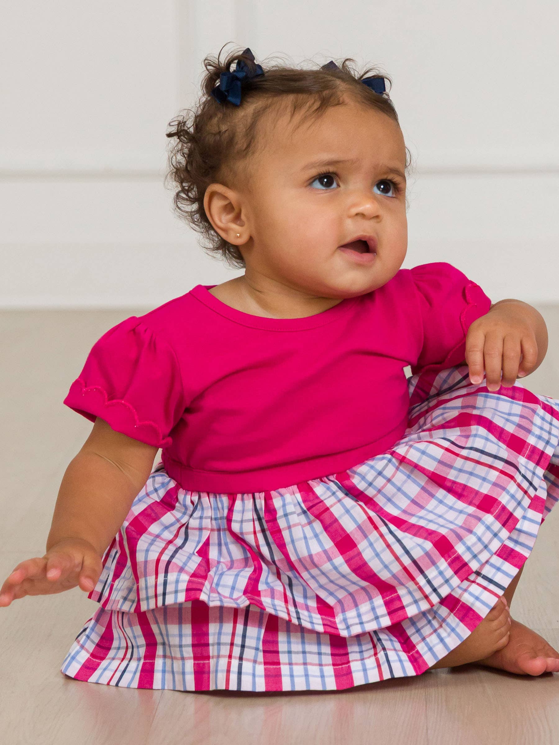 Pink Baby Girls Adley Plaid Short Sleeve Skirted Romper for wholesale on Faire1
