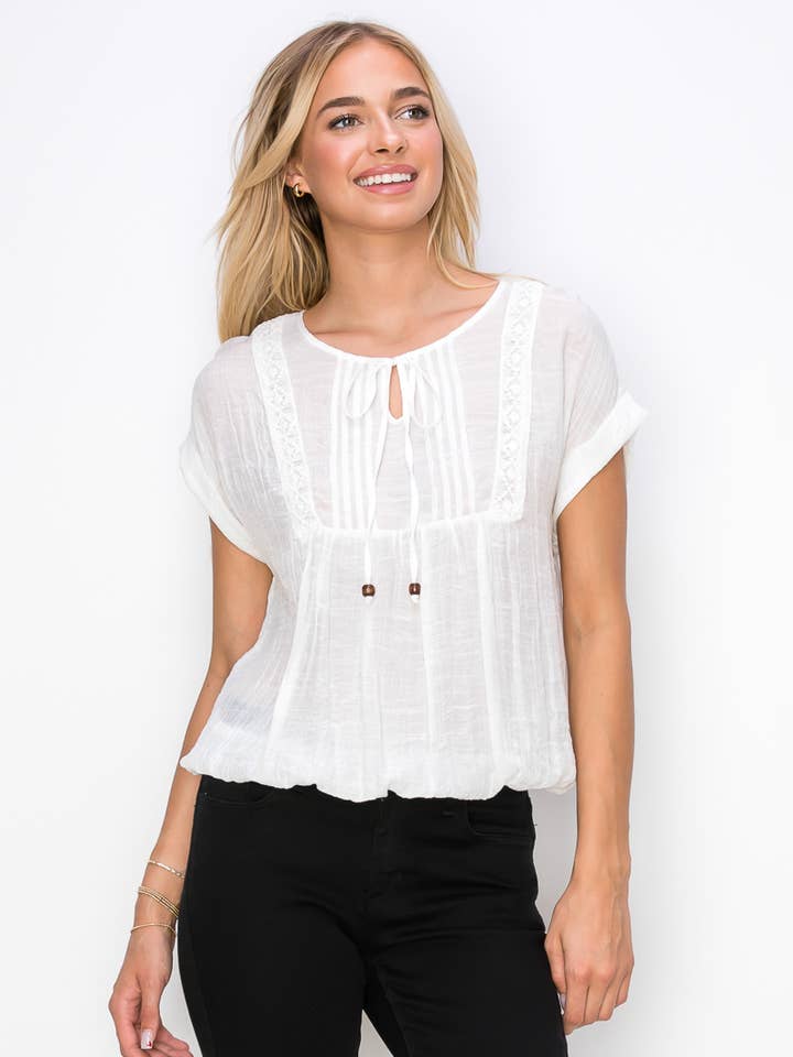 Ivory Keyhole Tie Neck Pintuck Front Peasant Blouse for wholesale on Faire