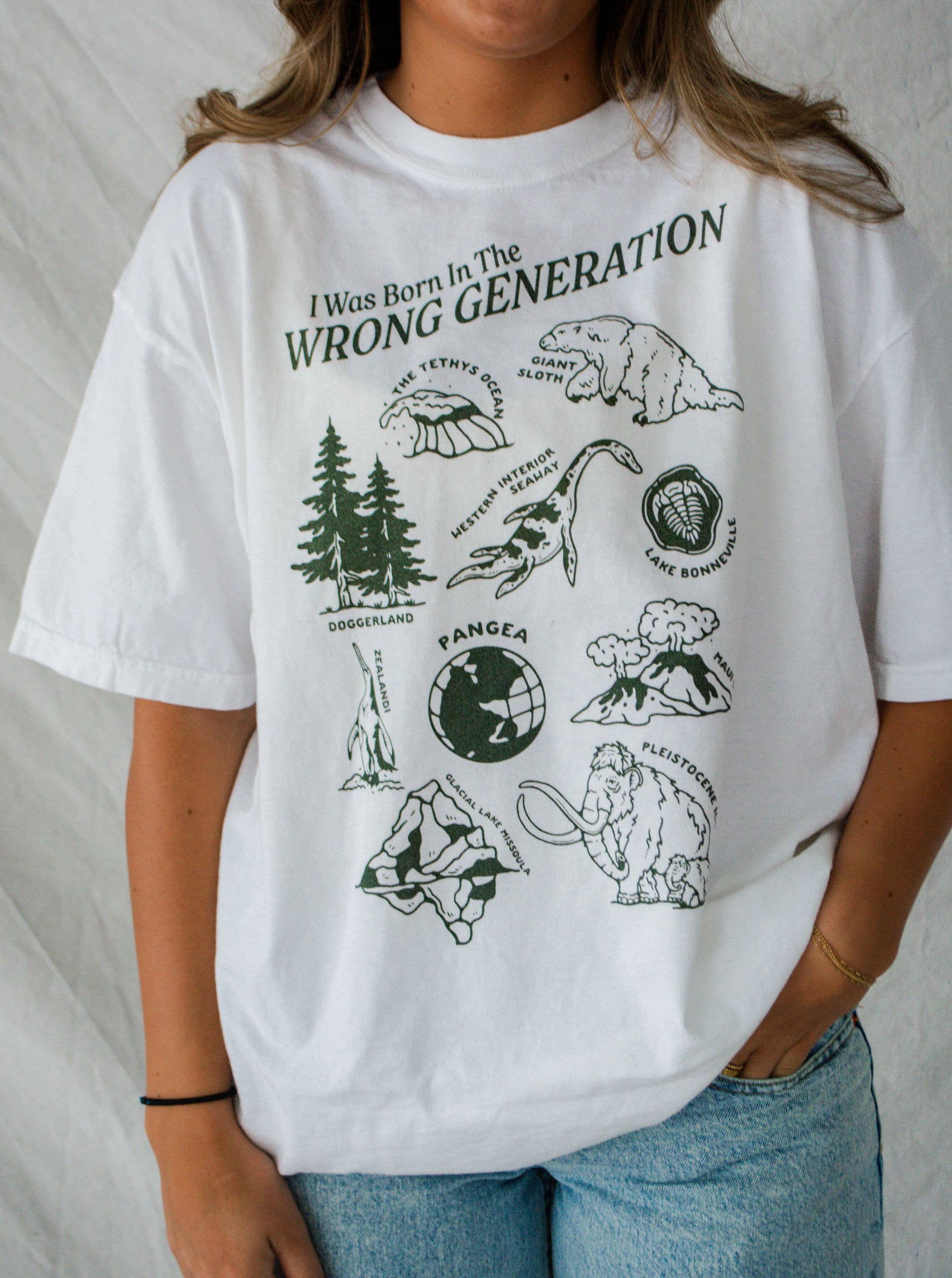 Traildust Goods - Wholesale Screen Printed T-Shirt - Women's - Wrong Generation Prehistoric Dinosaur Funny Tee (Green)