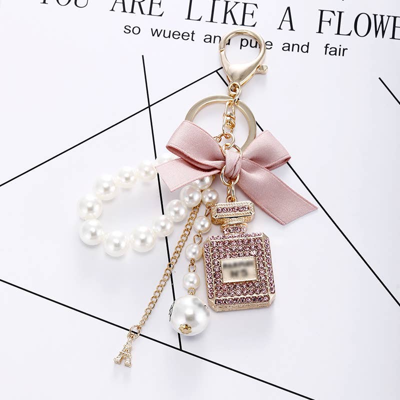 MKS America - Wholesale Keychain - Women's - Perfume Bottle Bow Pearl Bag Charm Keychain3