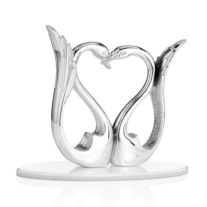 Scultura "Cigni Cuore"H.Cm.17 per la vendita all'ingrosso da parte di Ottaviani
