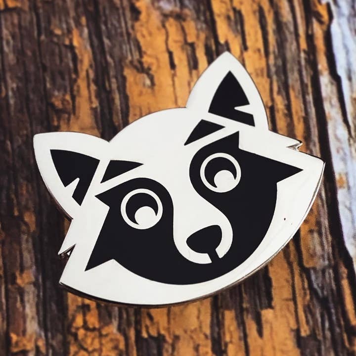 Trickster Raccoon - Enamel Pin for wholesale by The Fabled Creative Co.