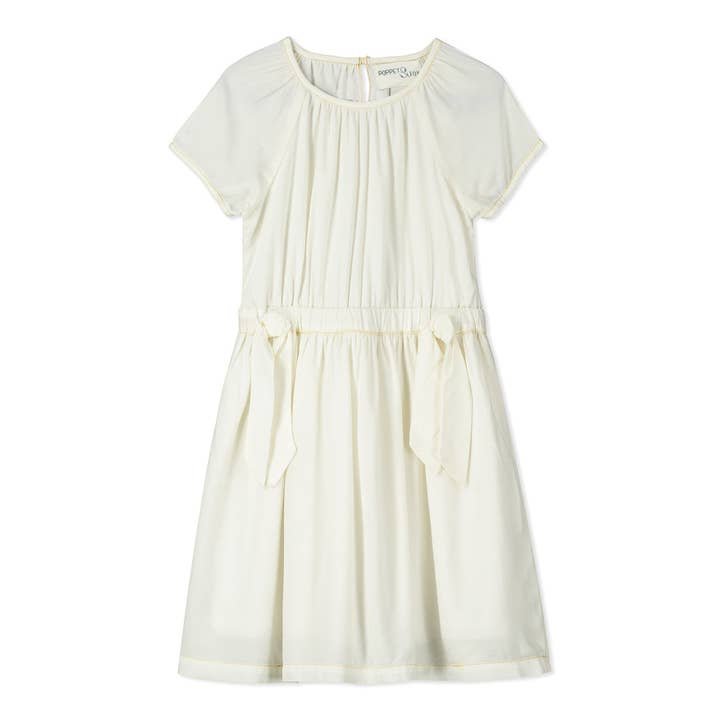 Bow detail dress in cream for wholesale by Poppet & Fox