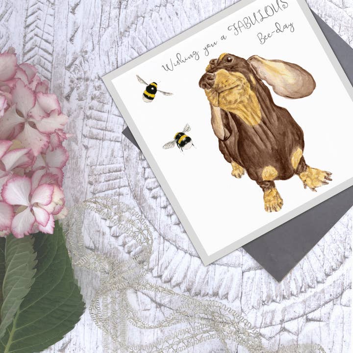 'Wishing you Fabulous Bee-day' Sausages and Bees dog card for wholesale by Utterly Conkers