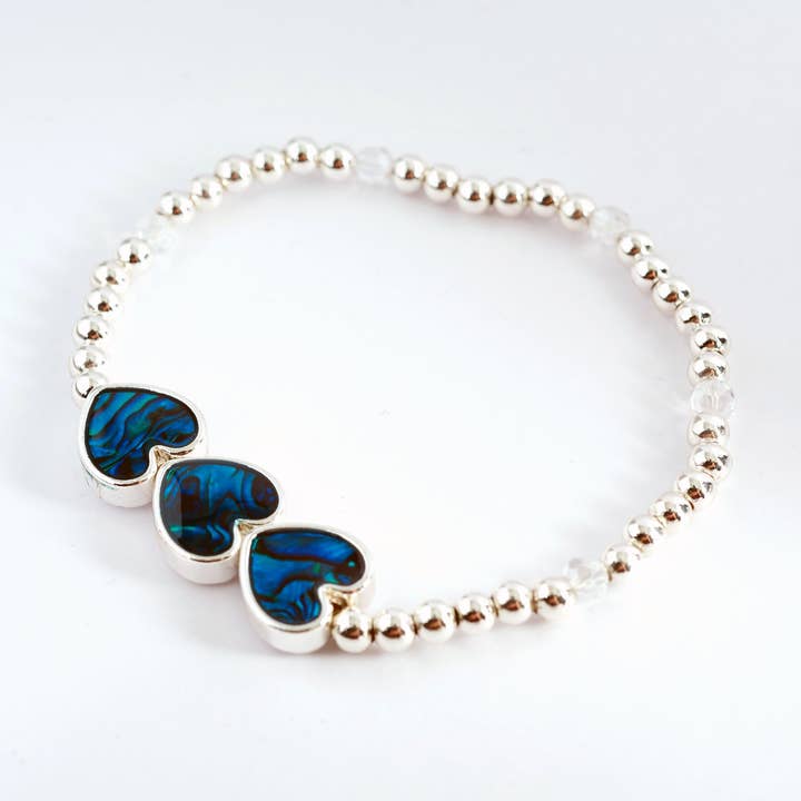Paua Shell Triple Hearts Stretch Bracelet, Rhodium Plated for wholesale by Byzantium Collection Ltd