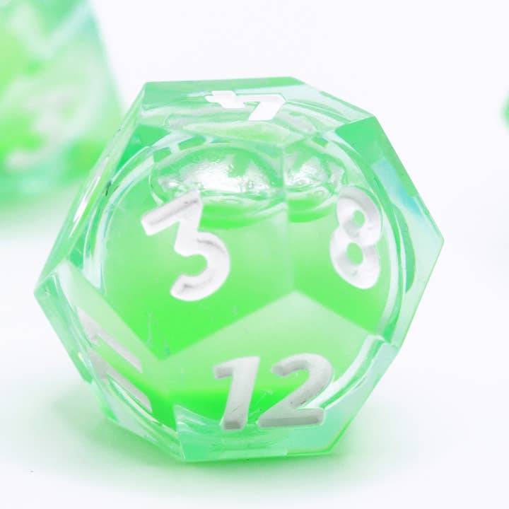 SET DE DÉS - CŒUR LIQUIDE PHOSPHORESCENT - RADIANT GREEN pour la vente par SPACE DELIRIUM