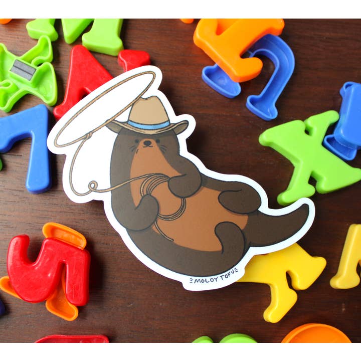 Otter Cowboy Vinyl Sticker for wholesale by Moldy Tofu Art