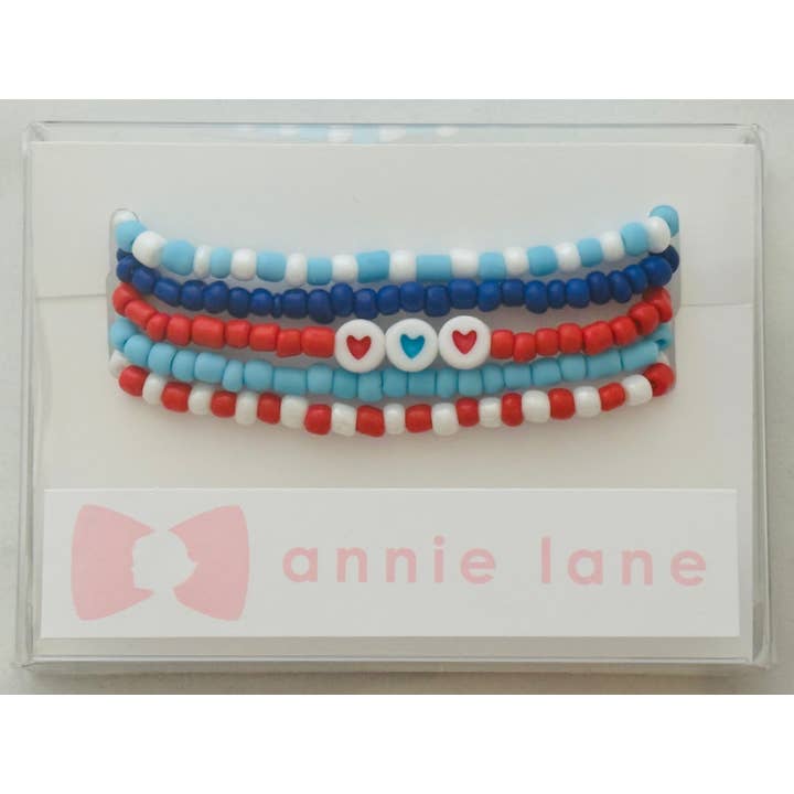 Ensemble de cinq bracelets perlés Annie Lane - Rouge, blanc et bleu pour la vente par Annie Lane