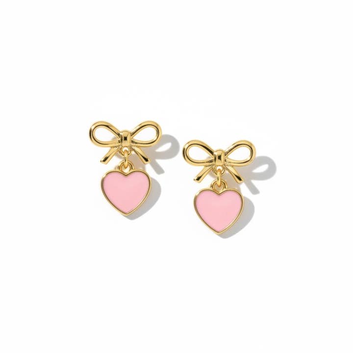 Boucles d'oreilles cœur en arc pour la vente par Dabble Doll