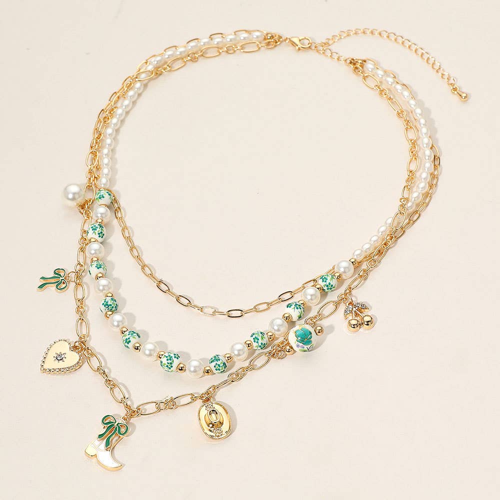 Sensibling Corp. - Wholesale Pendant/Charm Necklace - Western Cowboy Boot Hat Bow Cherry Heart Charm Station Pearl Floral Ceramic Ball Beaded Layered Necklace4