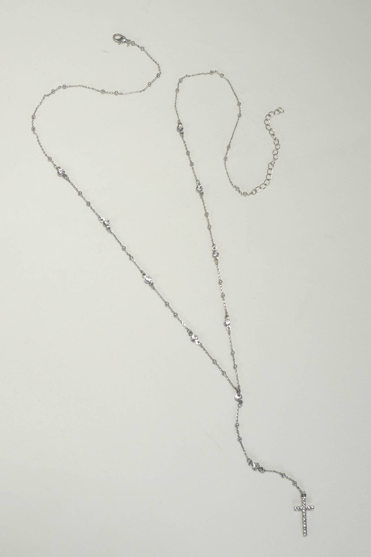 Silver BOHO Y NECK RHINESTONE STATION CROSS NECKLACE | 80N1076 for wholesale on Faire1