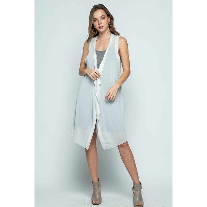 GILET TRANSPARENT EN TRICOT UNI À DEVANT OUVERT pour la vente par VOCAL