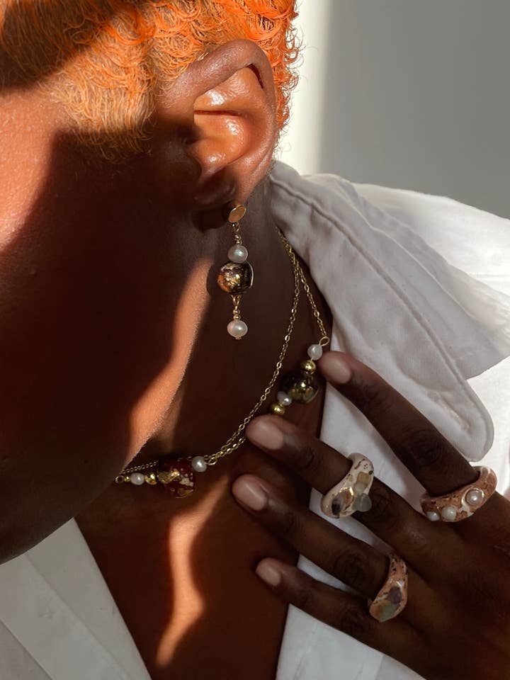 Boucle d'oreille Danesi pour la vente par Warm Jungle