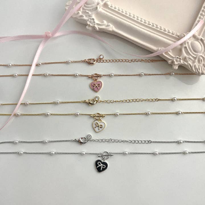 MOND HAUS - Wholesale Pendant/Charm Necklace - KOKOA Heart Charm Necklace with Ribbon and Pearl Accents