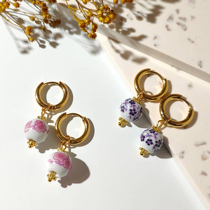 Orecchini a cerchio in ceramica cinese per la vendita all'ingrosso da parte di Vachana