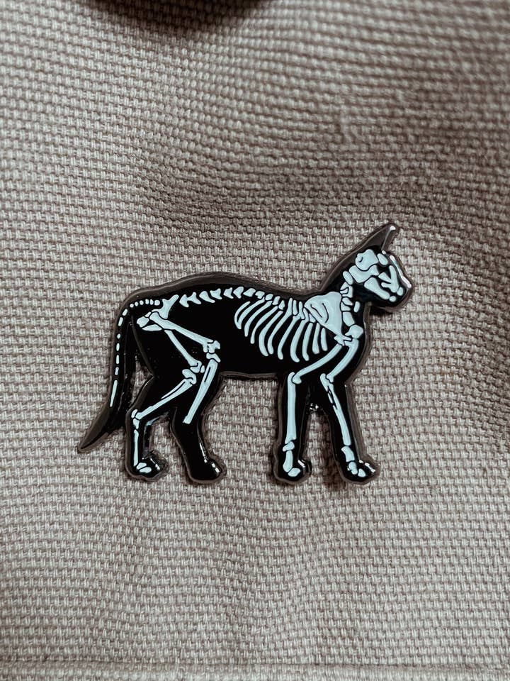 Enamel Pin - Cat Skeleton for wholesale by Whats Her Face