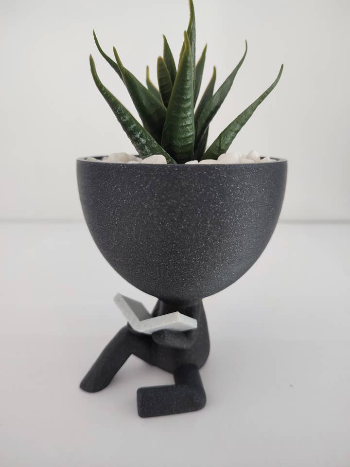 Person pot with book - Robert plant - Planter. for wholesale by 3DROOTS