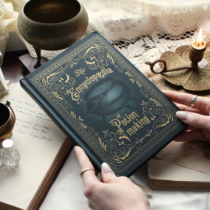 The Encyclopedia of Potion Making Gold Foiled A5 Hardback Notebook for wholesale by Well Read Company