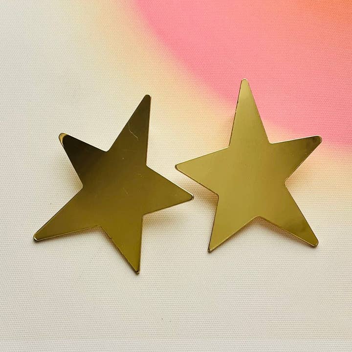 Orecchini maxi stelle dorate per la vendita all'ingrosso da parte di Pampa Mia