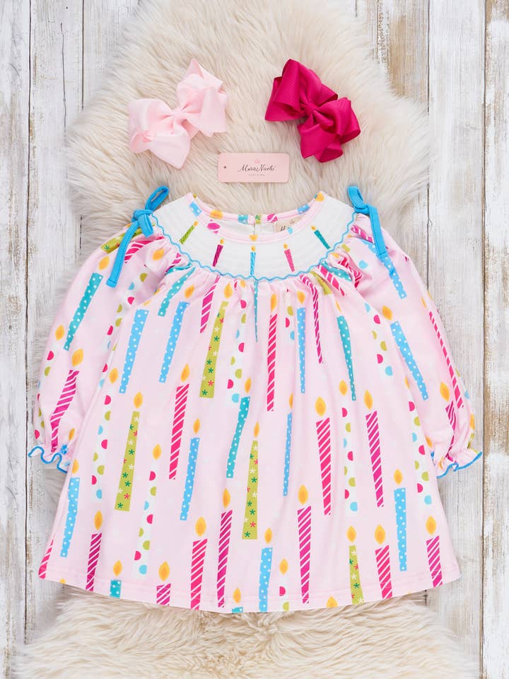 Wish Upon a Candle Smocked Dress for wholesale by Marie Nicole Clothing