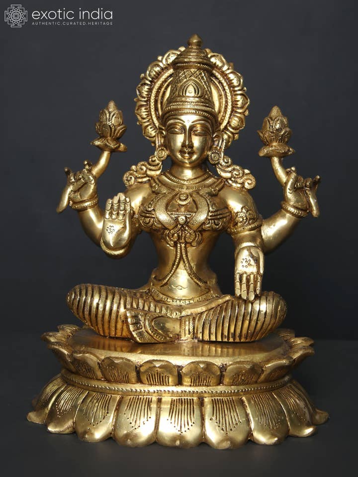 11" Four-Armed Devi Lakshmi Seated on Lotus | Brass Statue for wholesale by Exotic India Art