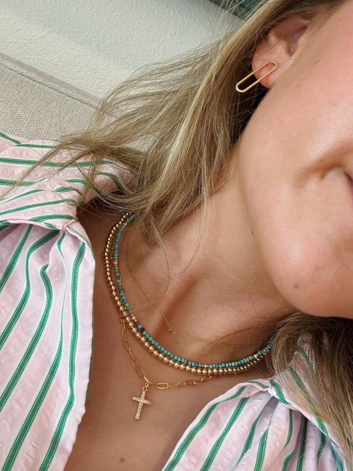 Trombone en forme de croix pavée sur un motif de bébé pour la vente par Grace Designs