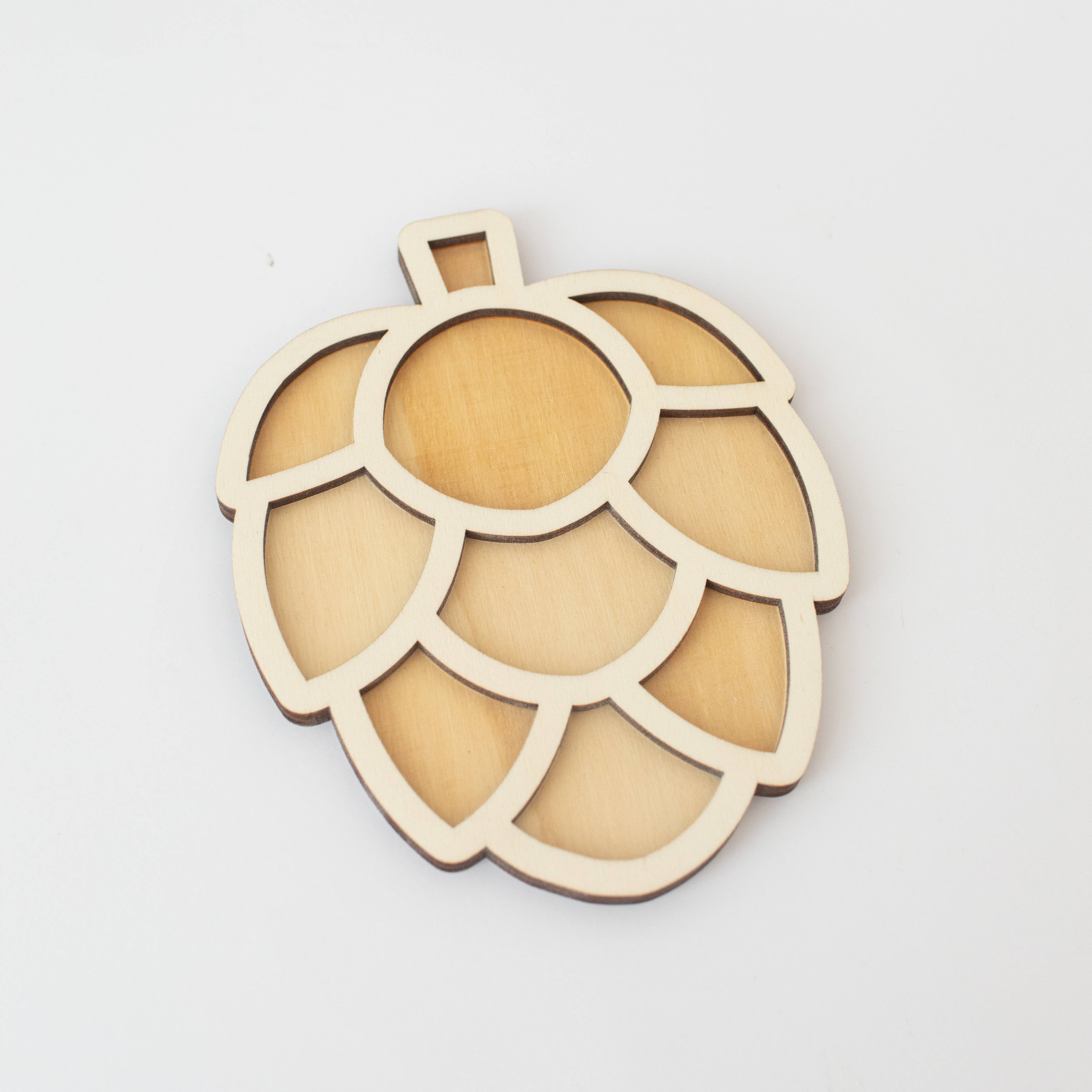 Studio de Rijk - Vente Jouet en bois – enfant - Plateau de jeu en forme de pomme de pin1