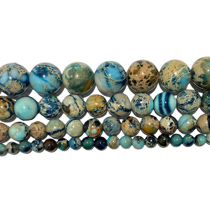 Heated striped blue imperial jasper bead thread for wholesale by Foliesbijoux