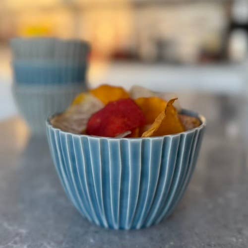 Carved soup bowl for wholesale by JULIA e. DEAN, Inc