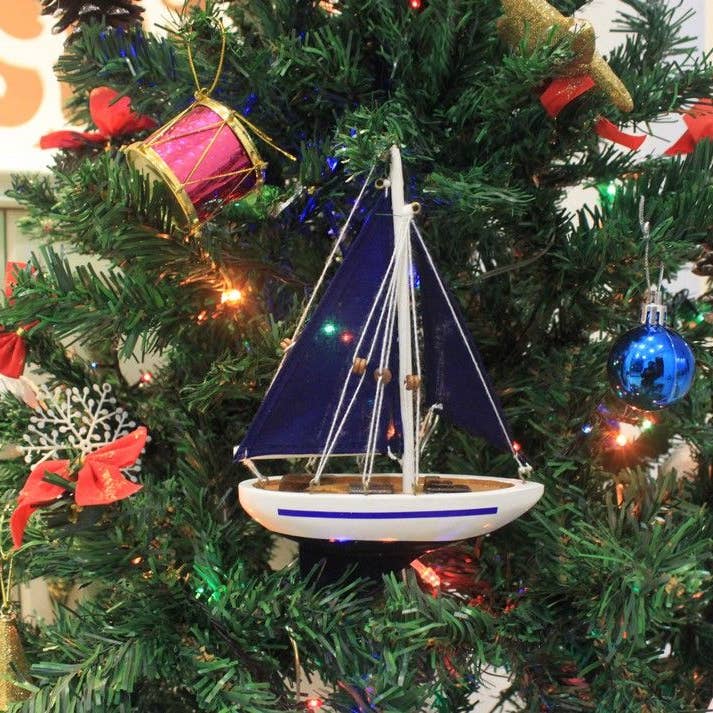 Wooden Blue Sailboat with Blue Sails Christmas Tree Ornament 9" for wholesale by Hampton Nautical