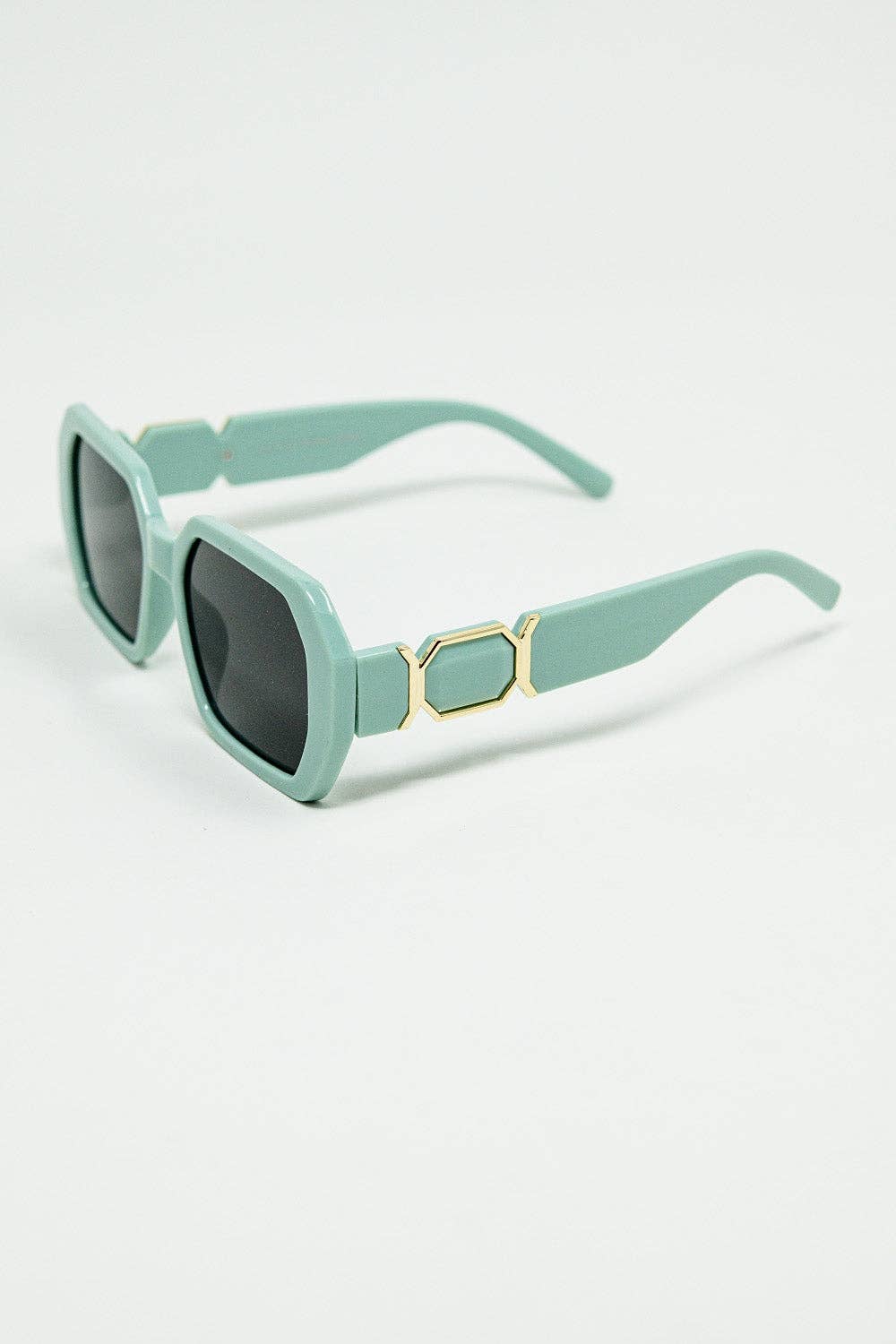 GREEN Diamond-Shaped Sunglasses with light Emerald Lenses for wholesale on Faire1