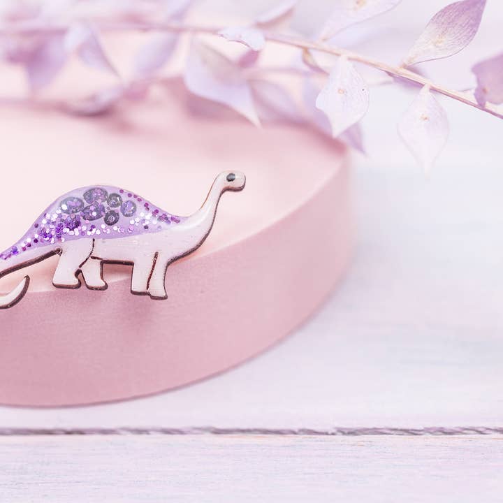 Diplodocus Dinosaur Pin Badge - Pastel Purple and Purple and other Purchase wholesale diplodocus. Free returns & net 60 terms on Faire trending on Faire.