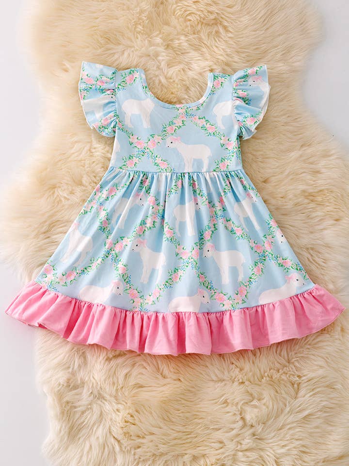 Sweet Lamb printed on blue dress with pink ruffle trim.DRG50 for wholesale by Kids Charm Online
