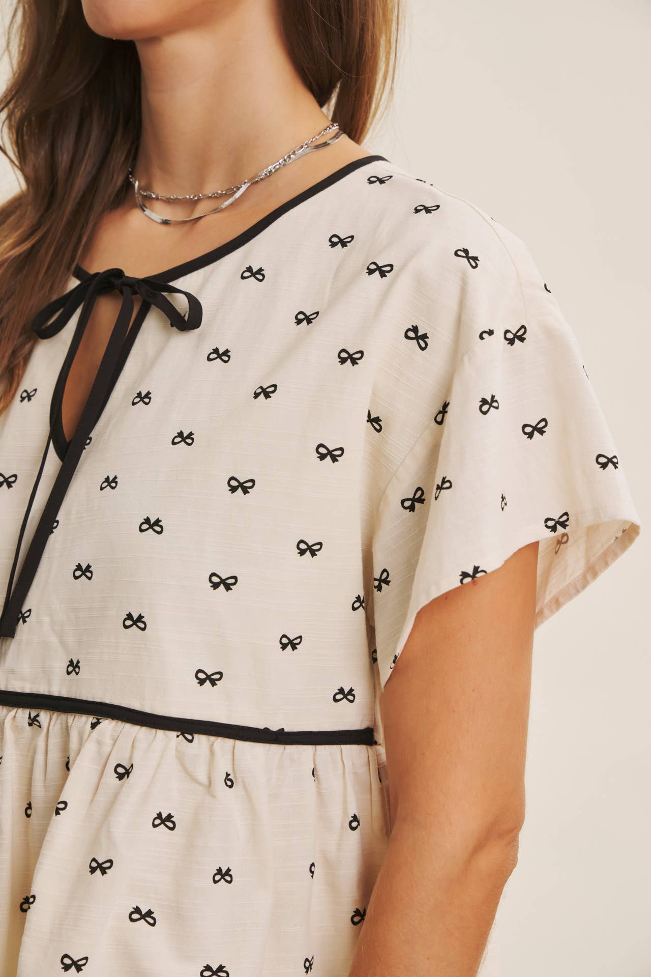 in february - Wholesale Blouse - Women's - SUNNY DAYS BOW PRINT BABYDOLL BLOUSE WITH CONTRAST BINDING12